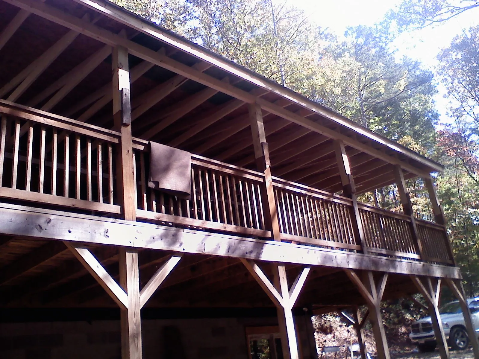 Timber framing under a new elevated porch and deck — Roof Leak Repair in East Fultonham by Roofing Brothers